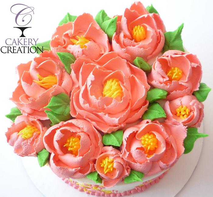 peach all buttercream flower cake