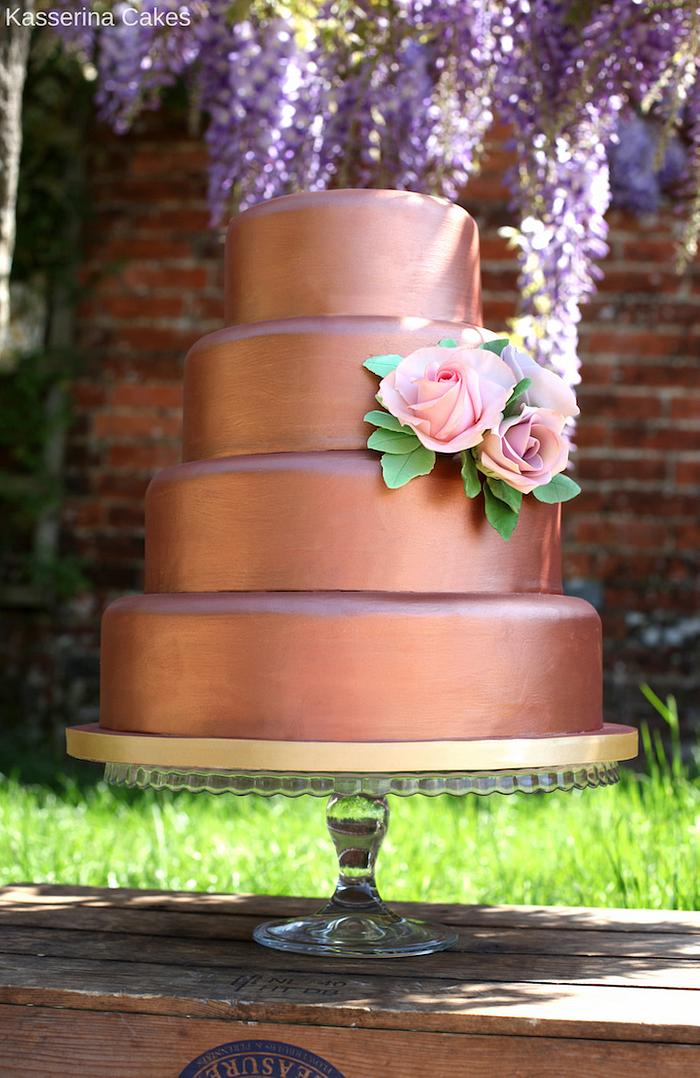 Rose gold 4 tier cake with sugar roses