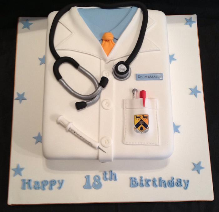 Doctors coat cake