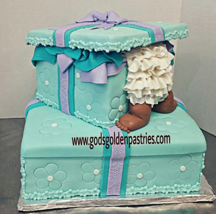 Baby in gift box baby shower cake