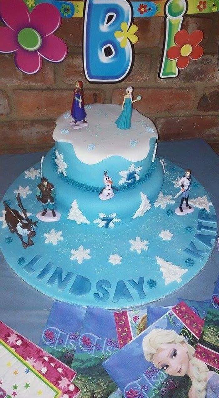Frozen Theme cake with elsa and Anna toys