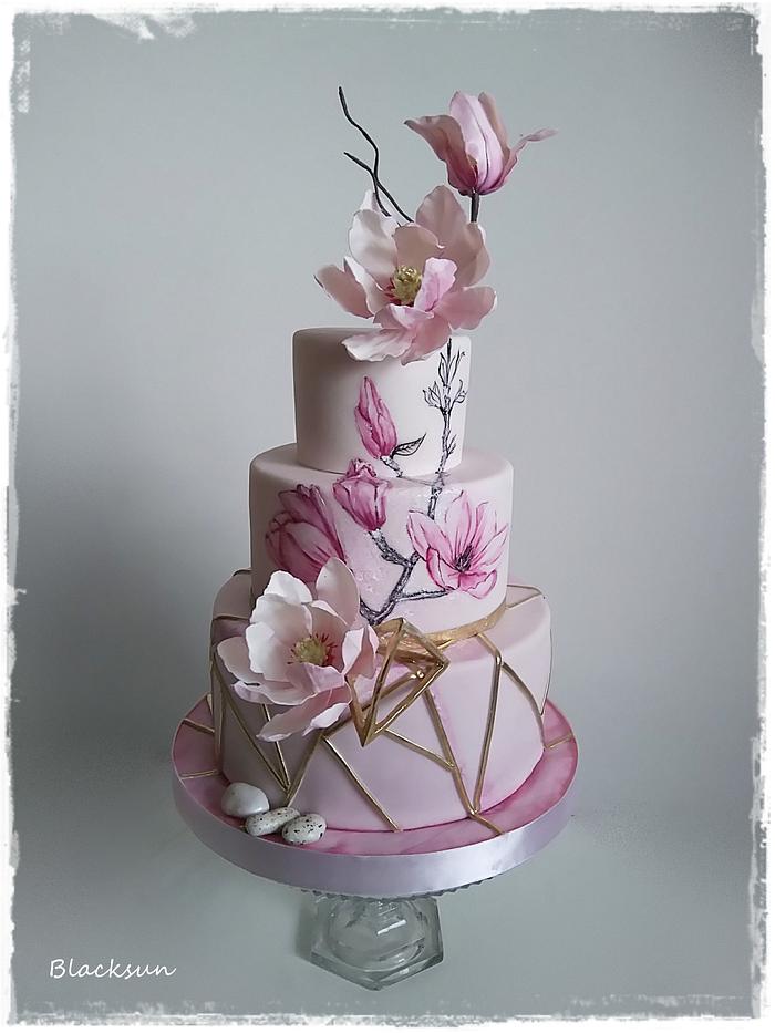 Wedding cake with magnolia flowers