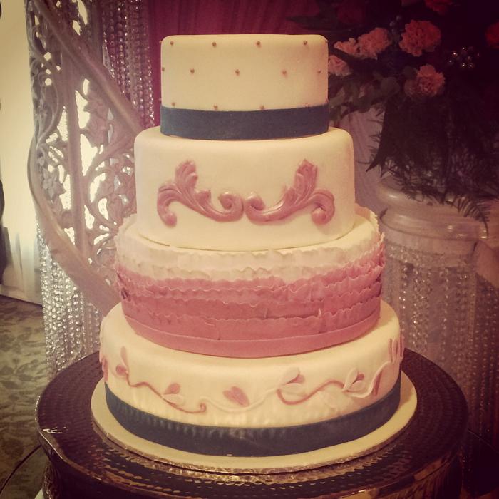 Pink ruffles 25th wedding anniversary cake.