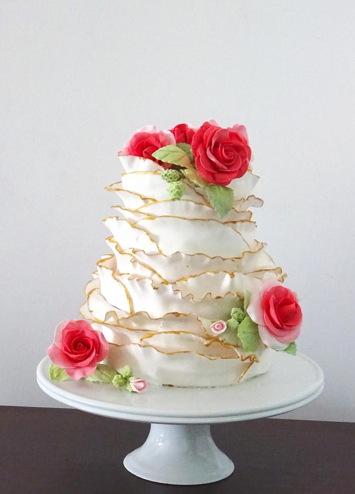 A engagement cake with ruffles and Roses 