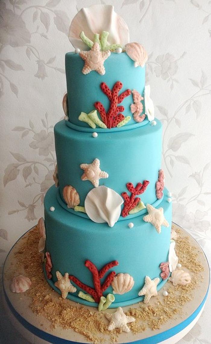 Beach themed wedding cake