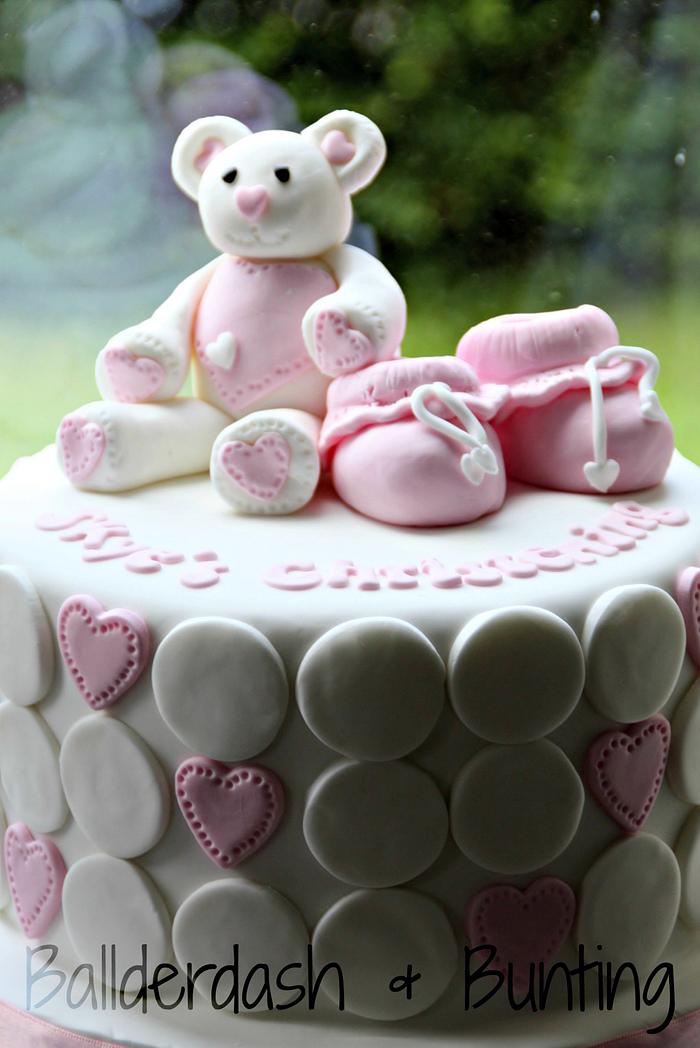 Teddy and booties christening cake