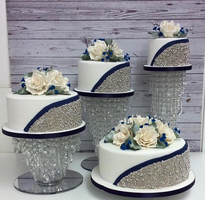 4 Tier Silver ball and navy blue wedding cake