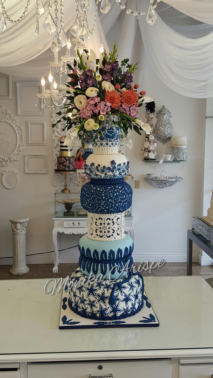 Wedding Cake with vase flowers topper