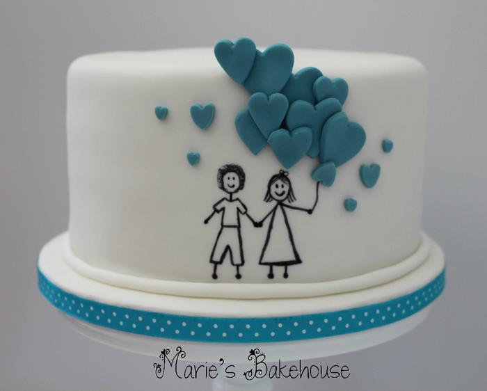 Cartoon couple with blue balloons wedding cake