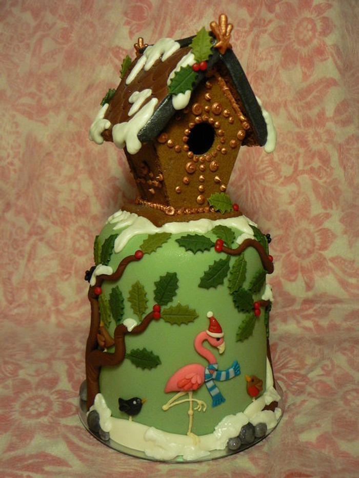 Mini Christmas cake with gingerbread birdhouse, for a bird lover.