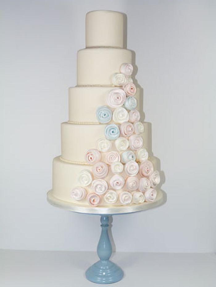 Pastel meringue swirl wedding cake