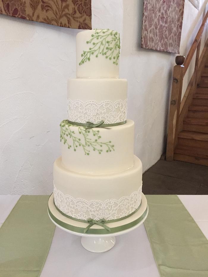 Edible lace and royal icing piped leaves and buds