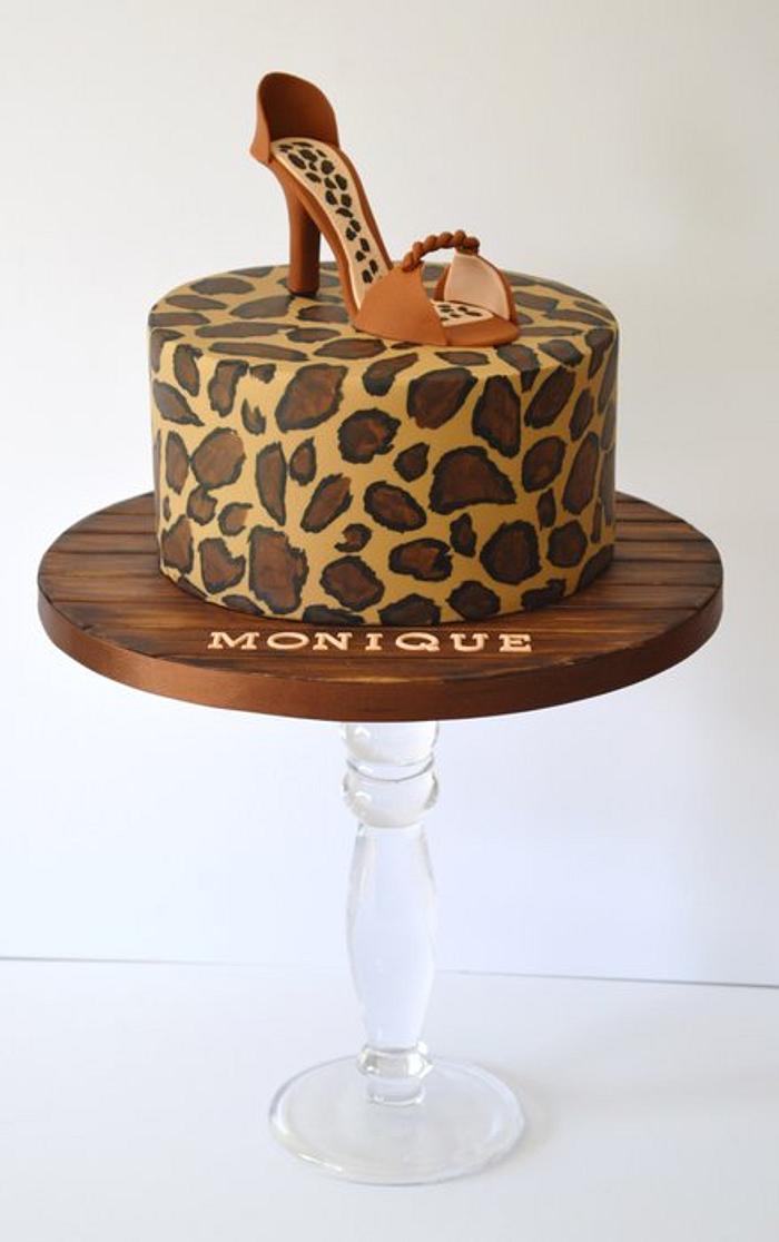 Hand painted leopard print cake sugarpaste shoe topper and wood grain board