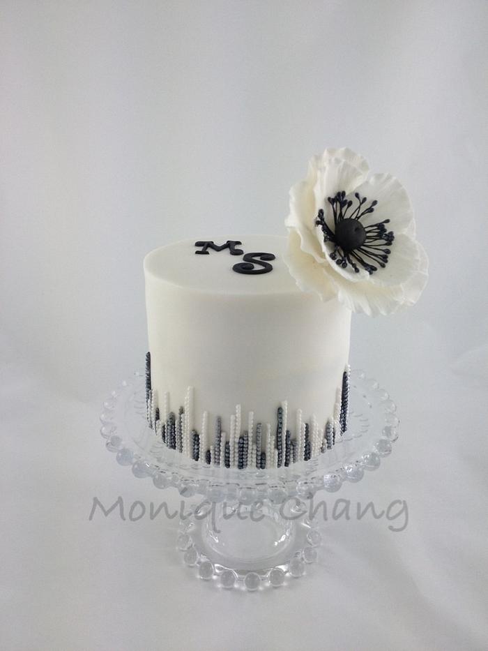 Black and white anemone cake