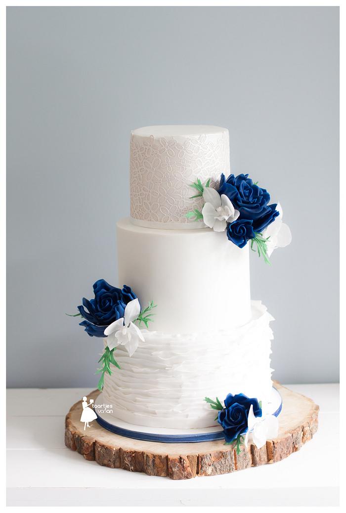Navy blue roses with puren white orchids