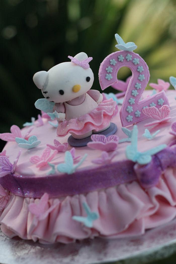 Hello Kitty with a tutu and butterflies