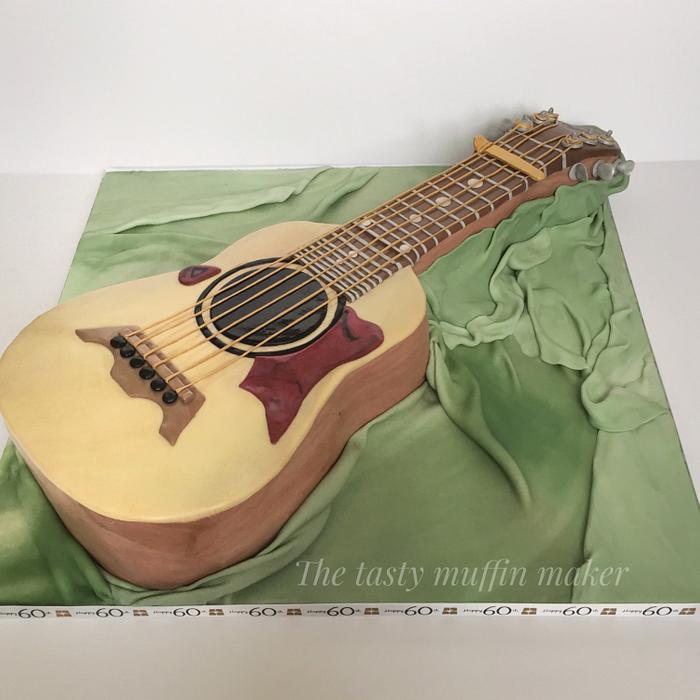 Big baby Taylor Guitar cake 