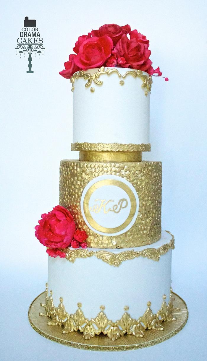 White and Gold cake with Red flowers