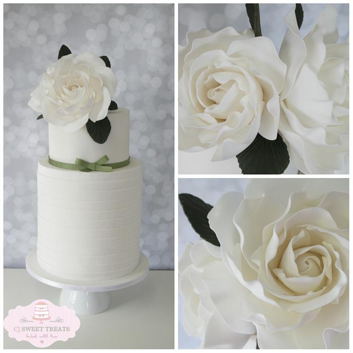 Double barrel wedding cake with oversized roses