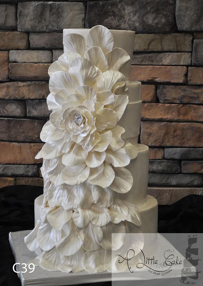 Fondant Wedding Cake With An Overflowing Flower