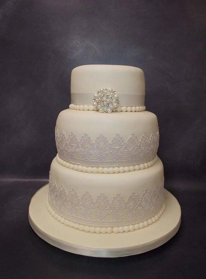 Ivory and lace wedding cake