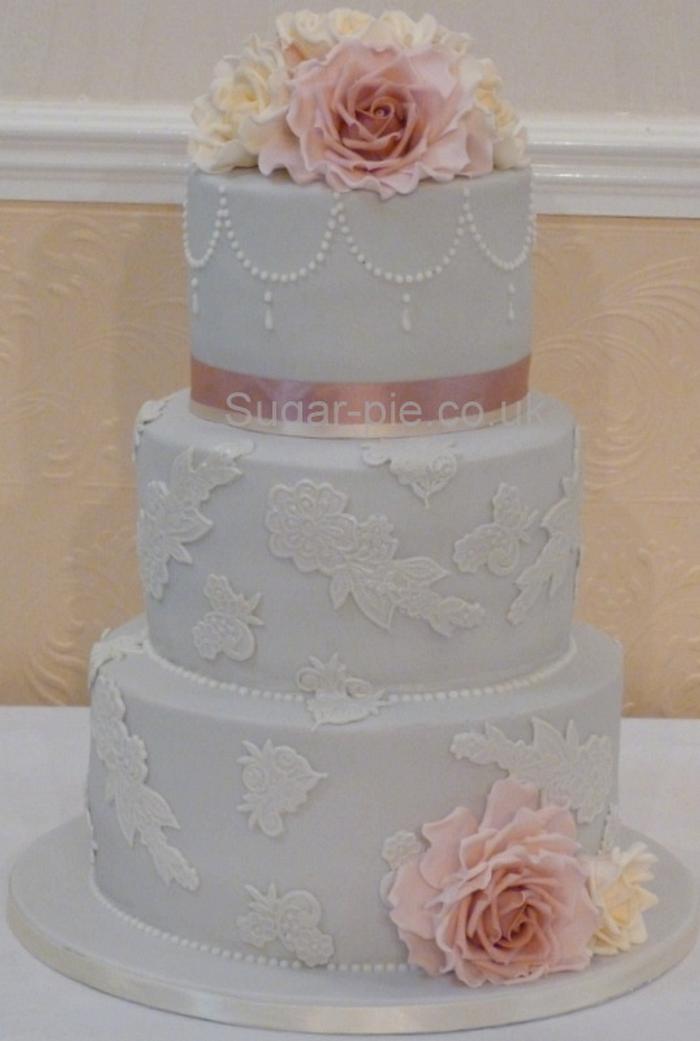 Grey lace and rose wedding cake