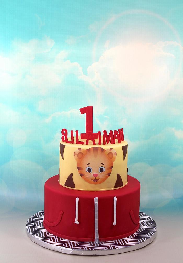 daniel tiger neighbourhood - Decorated Cake by soods - CakesDecor