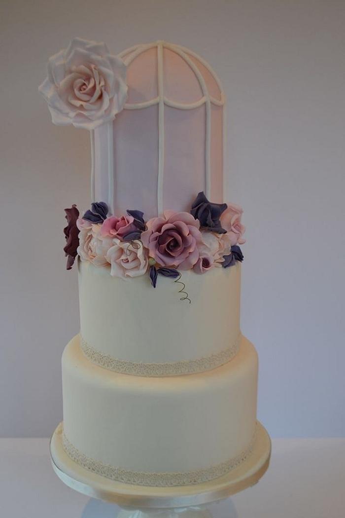 English blooms birdcage wedding cake