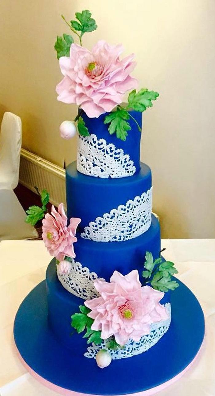 Vintage topaz blue, dahlias and doilies wedding cake