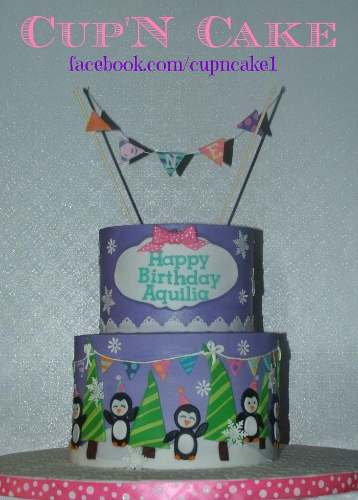 Penguin winter themed first birthday cake