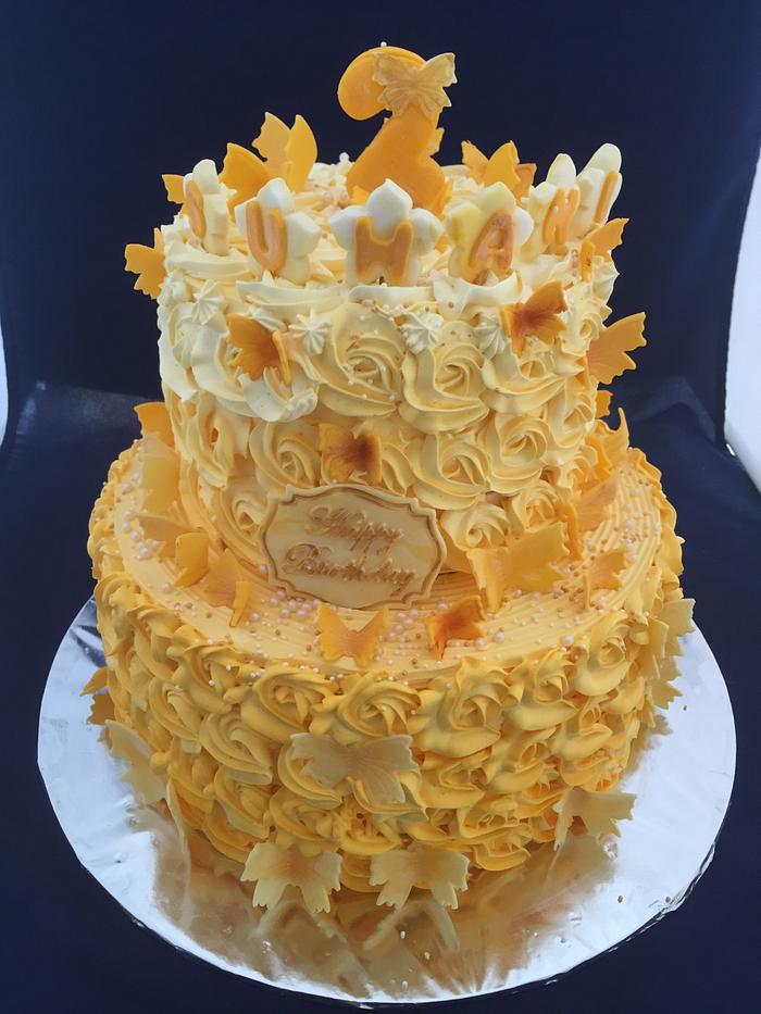 Yellow ombré cake with edible butterflies 