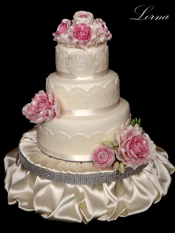 Vintage cake with peony, roses and ranunculus..