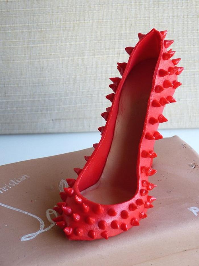 Christian Louboutin red shoe