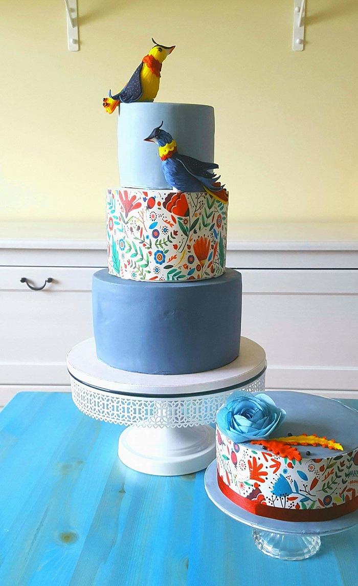 Dusty blue folk wedding cakes