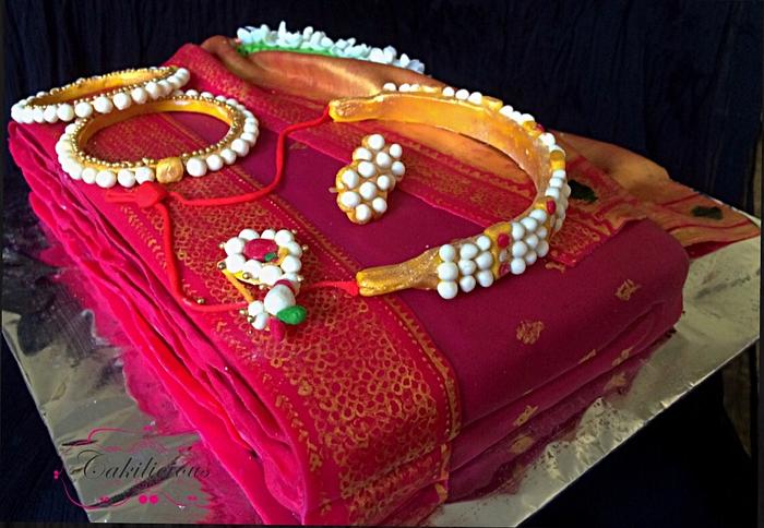 A Traditional saree and jewellery cake