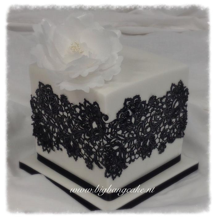 Cake with Lace, sharp edges and a waffer flower! 