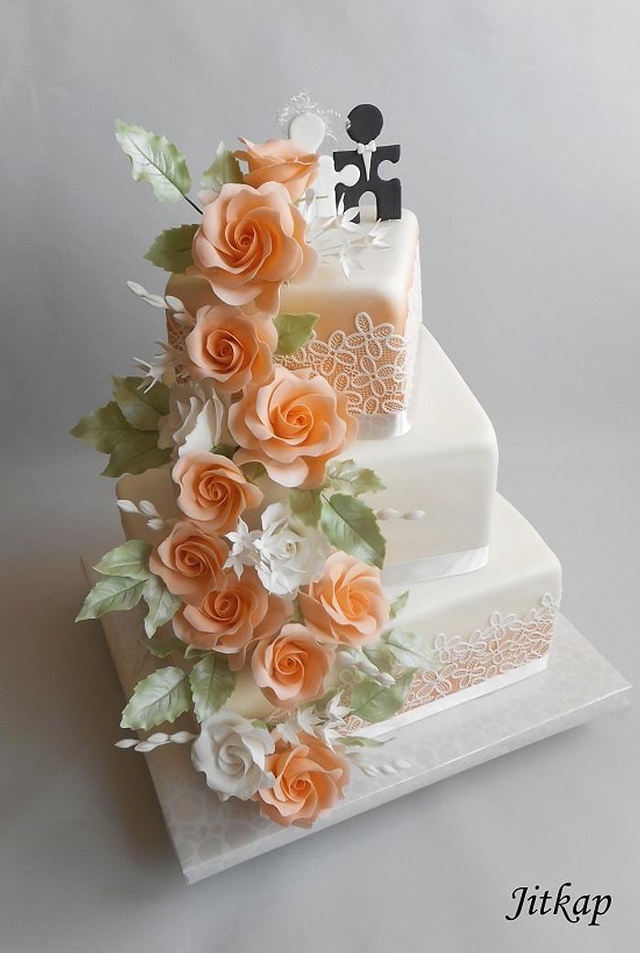 Wedding cake with orange roses