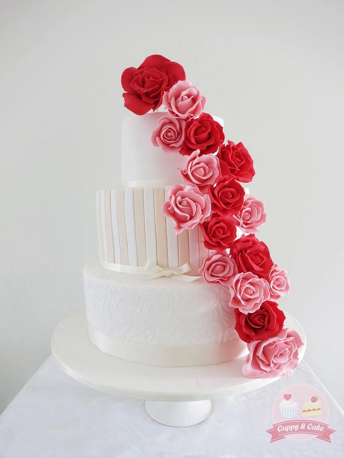 Wedding cake with cascade of roses