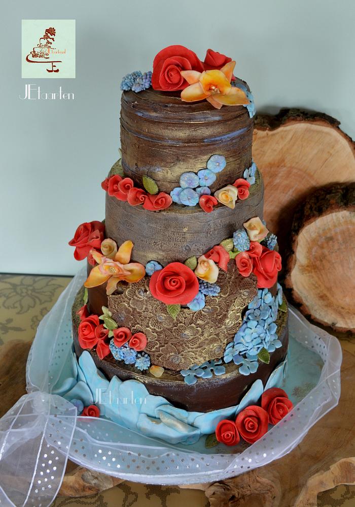 colorful chocolate weddingcake with chocolate lace