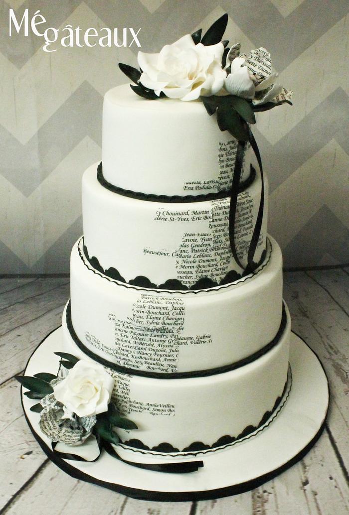 Chic black and white wedding cake with custom monogram