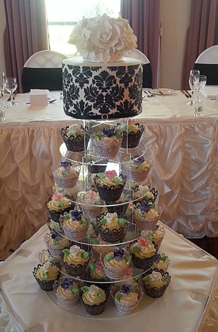 Simple wedding cake and cupcakes
