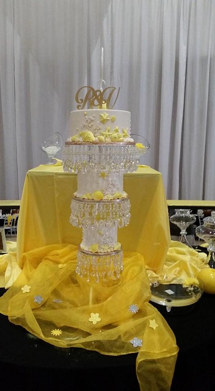 Yellow seathemed wedding cake hanging
