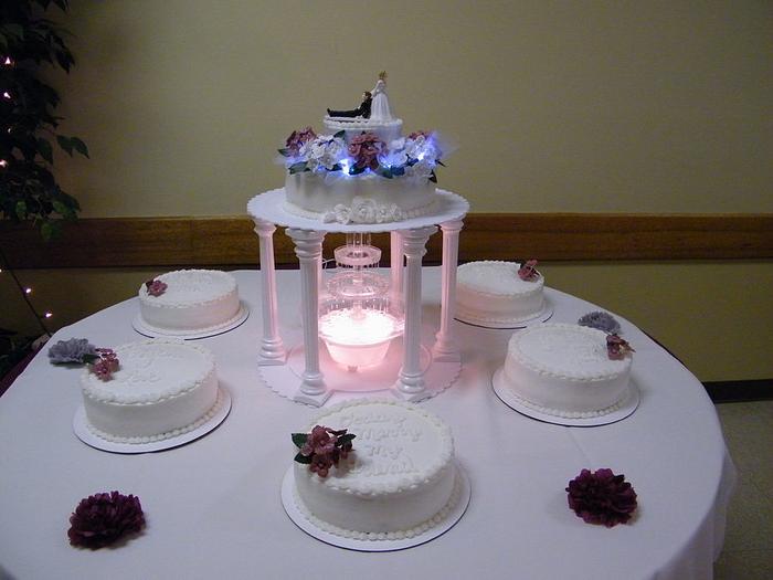 Wedding cake w/fountain and satelite cakes