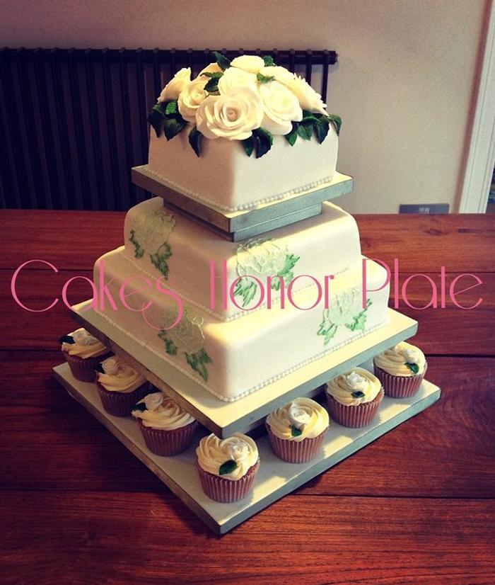 Rose themed wedding cake