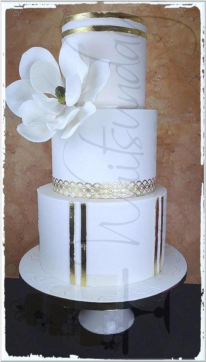 Edible Goldleaf and Magnolia Wedding Cake