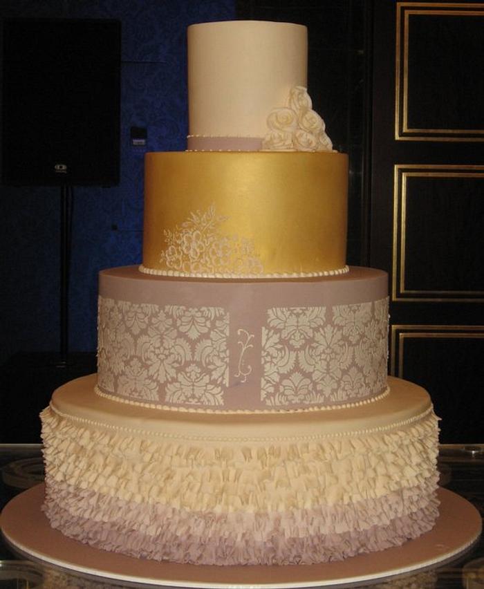 Four Tier Wedding cake in Gold with Frills