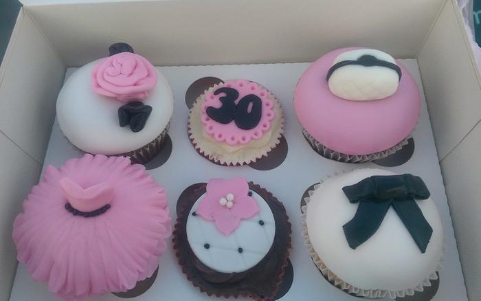 Girly chic pink, black and white cupcakes