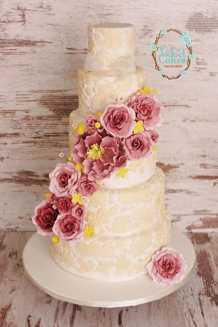 Lace and roses wedding cake