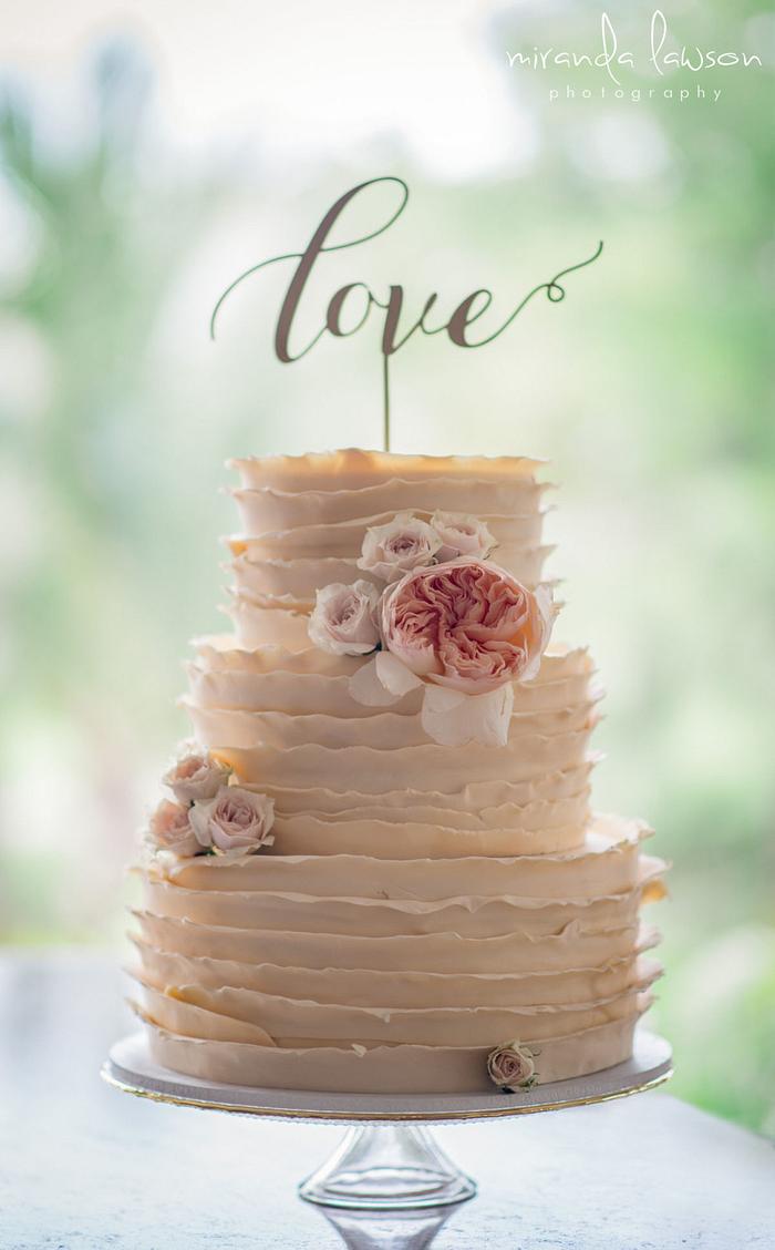 "Love" Ruffled Wedding Cake