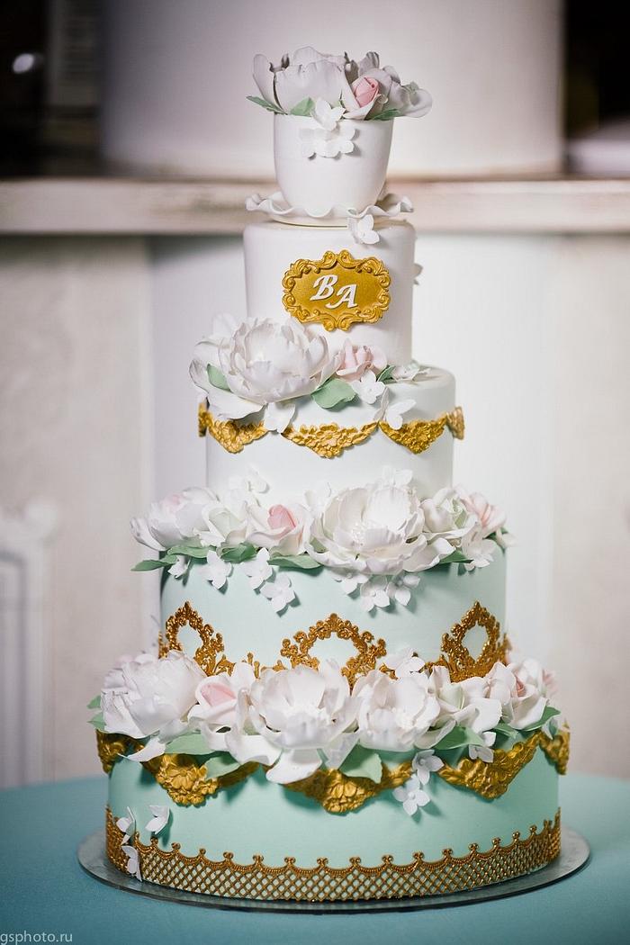Mint and gold wedding cake